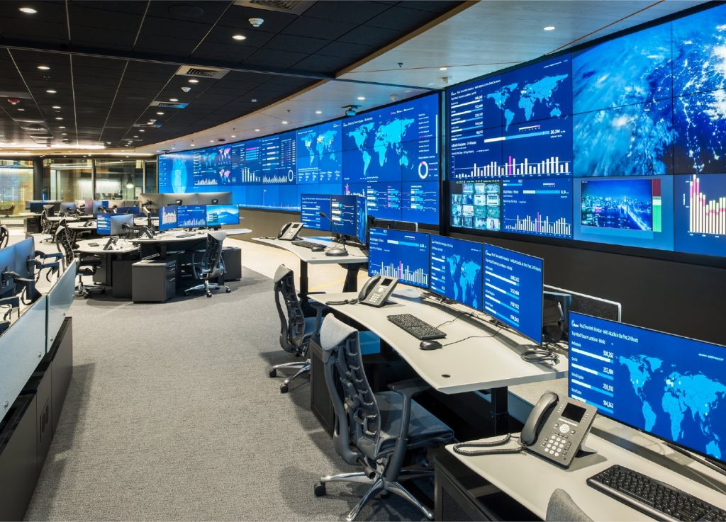 operations center with large video wall and custom console furniture