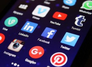social media and app logos on phone