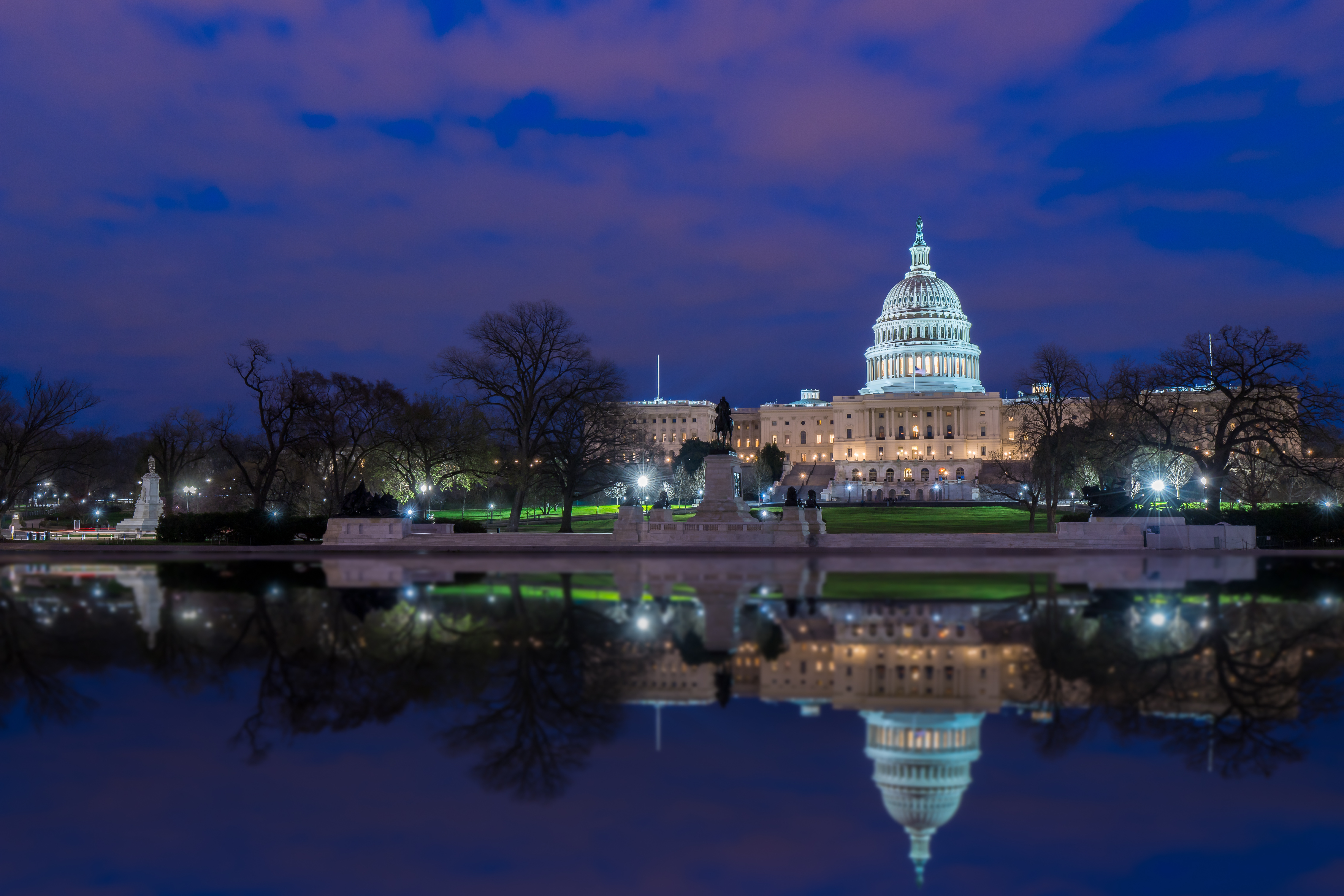 The United States Capitol with reflection at night, Washington D