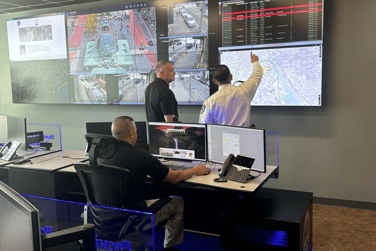 Providence Police officers monitoring surveillance feeds in real-time crime center